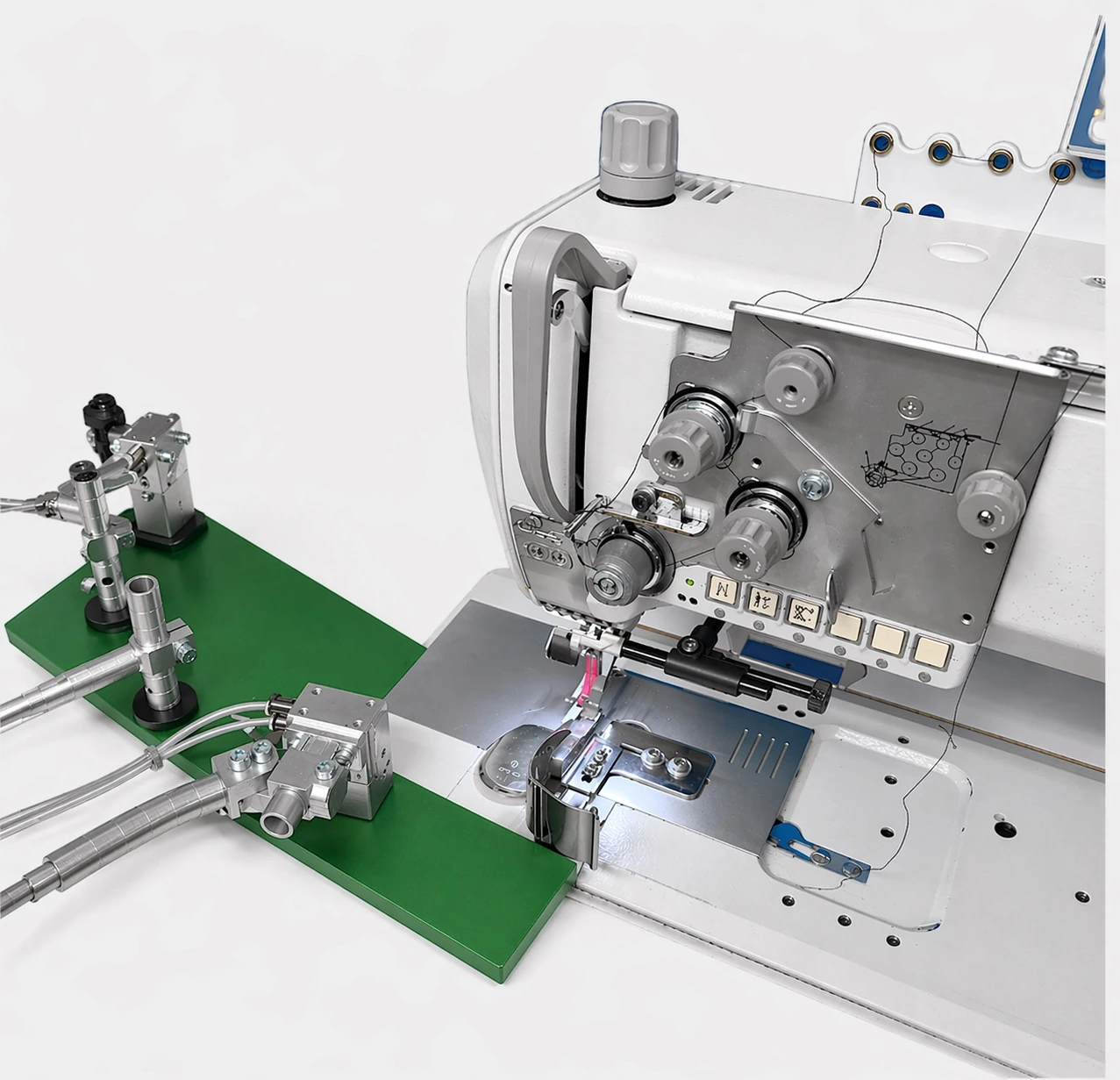 Technology setup with robot, gripper, sewing machine and camera