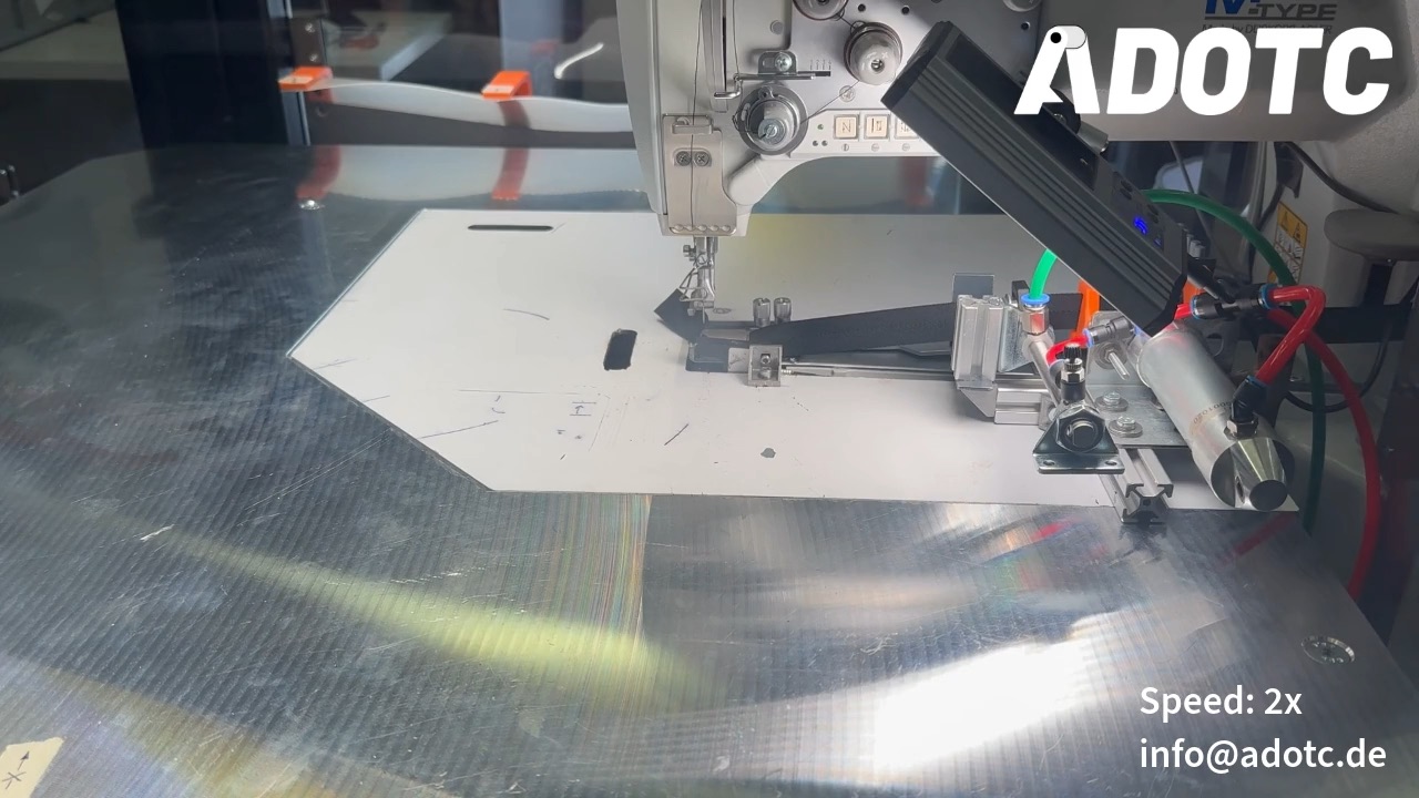 Automated binding in the ADOTC robotic sewing system – additional view